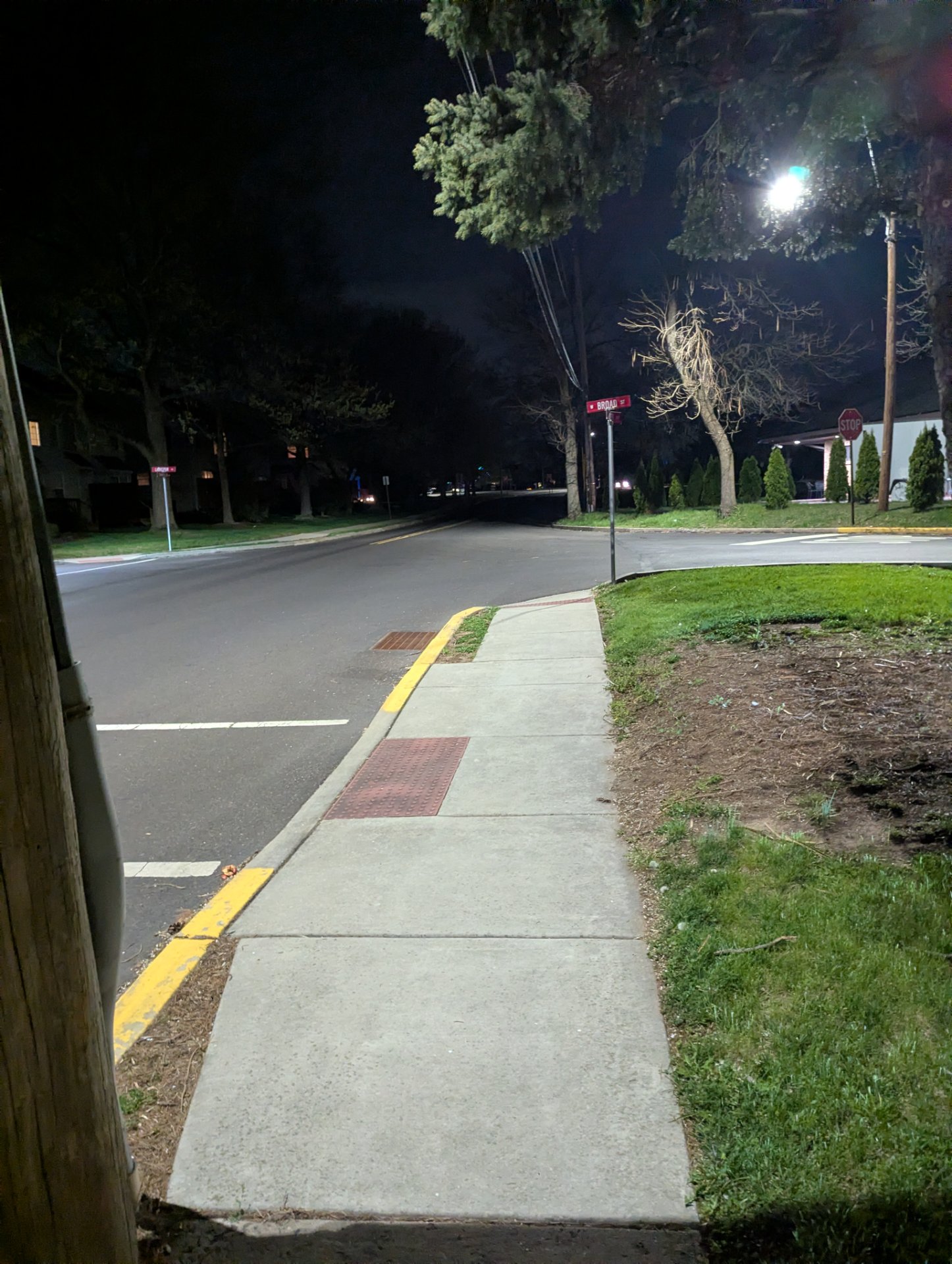 A nighttime walk or run through a suburban neighborhood with well-lit streets and sidewalks. Perfect for an evening cardio session!