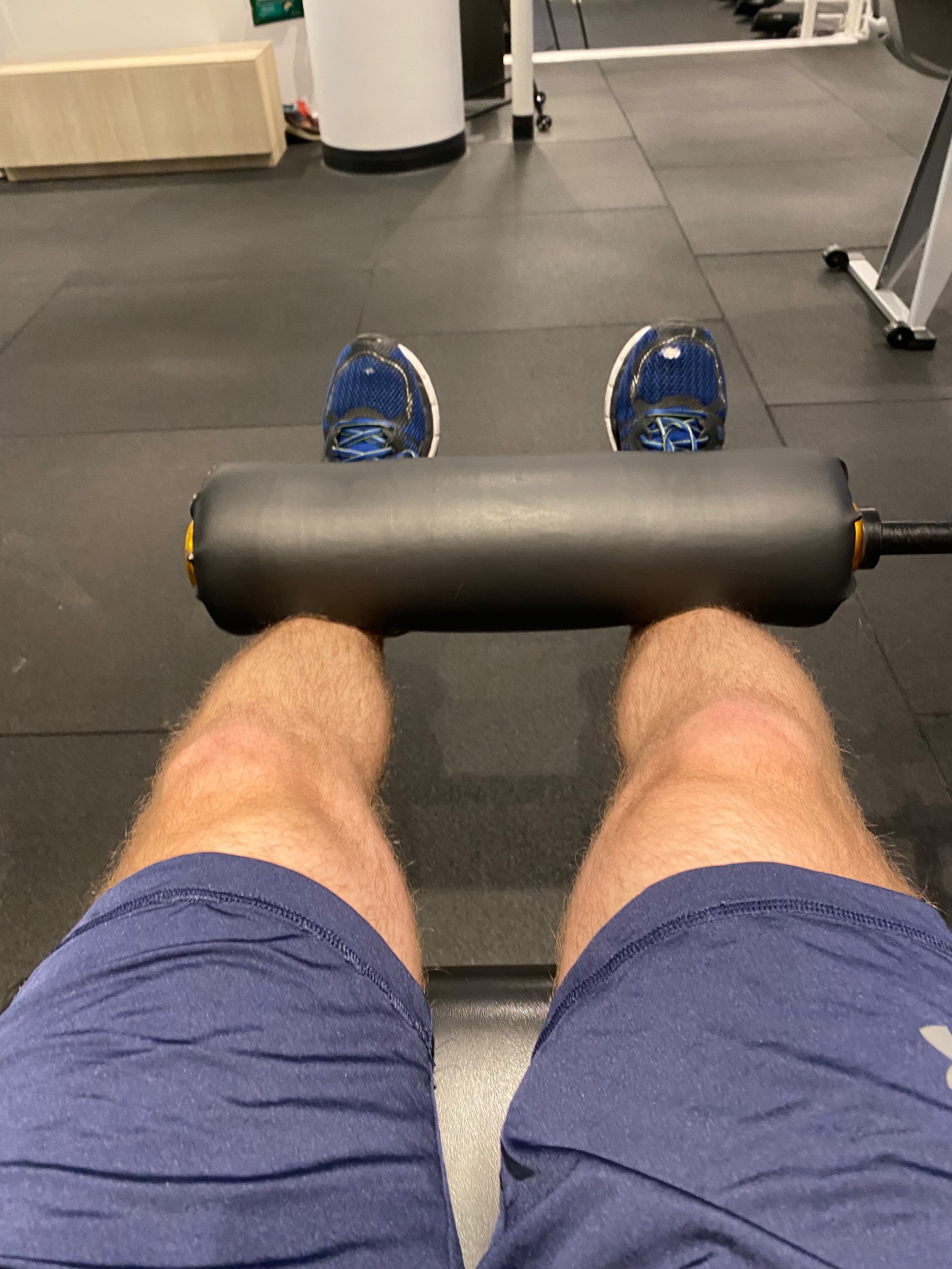 Core and lower body workout using a foam roller for muscle recovery and self-myofascial release at the gym. Great way to enhance mobility and reduce muscle tension after training!