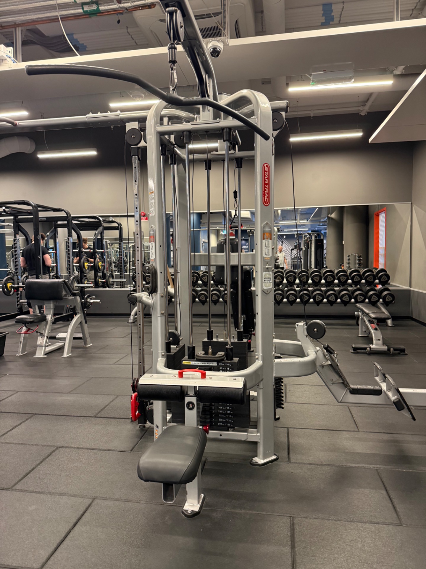 A gym workout featuring cable machine resistance training. This setup showcases dedicated strength and resistance work using professional gym equipment.
