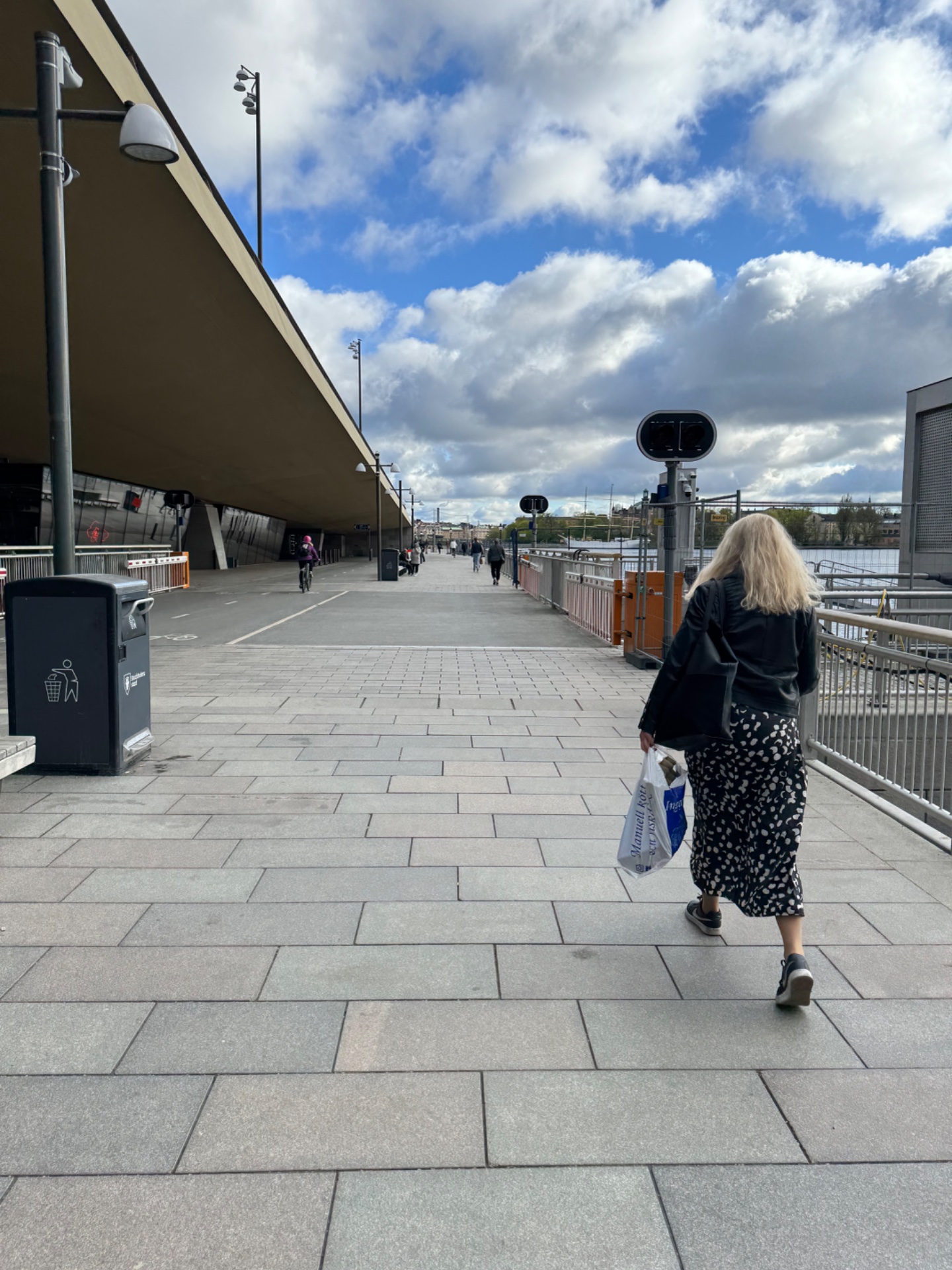 A casual outdoor walk along a waterfront promenade with scenic views. Great way to get some steps in while enjoying the fresh air and beautiful surroundings!