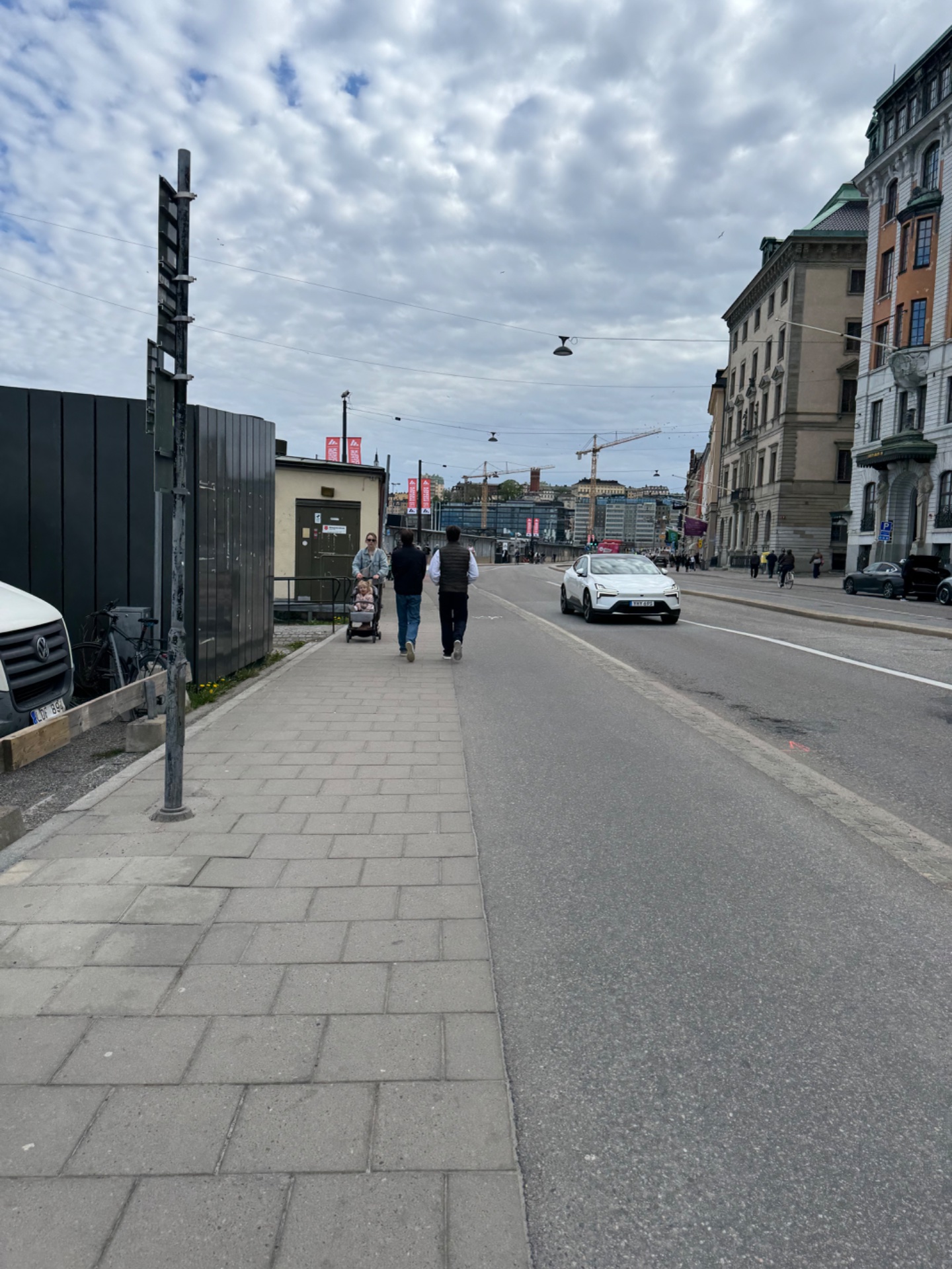 Urban walking workout through a European city street. A great low-impact cardio session exploring the urban landscape with scenic architecture in the background!