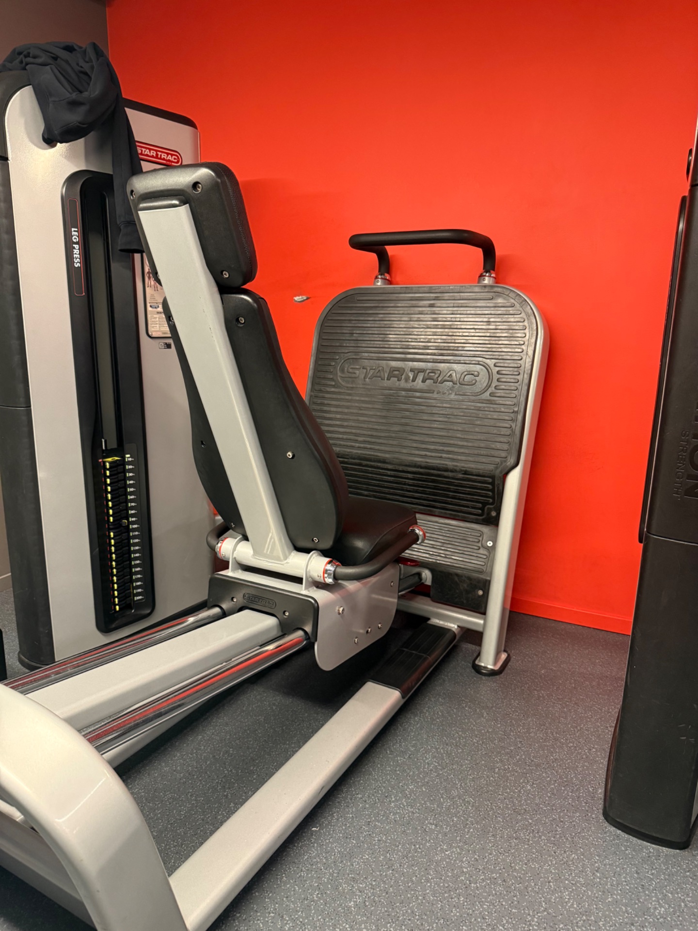 A glimpse of professional gym equipment! This image shows Startrac strength training machines in a modern fitness facility, perfect for resistance and strength-building workouts.